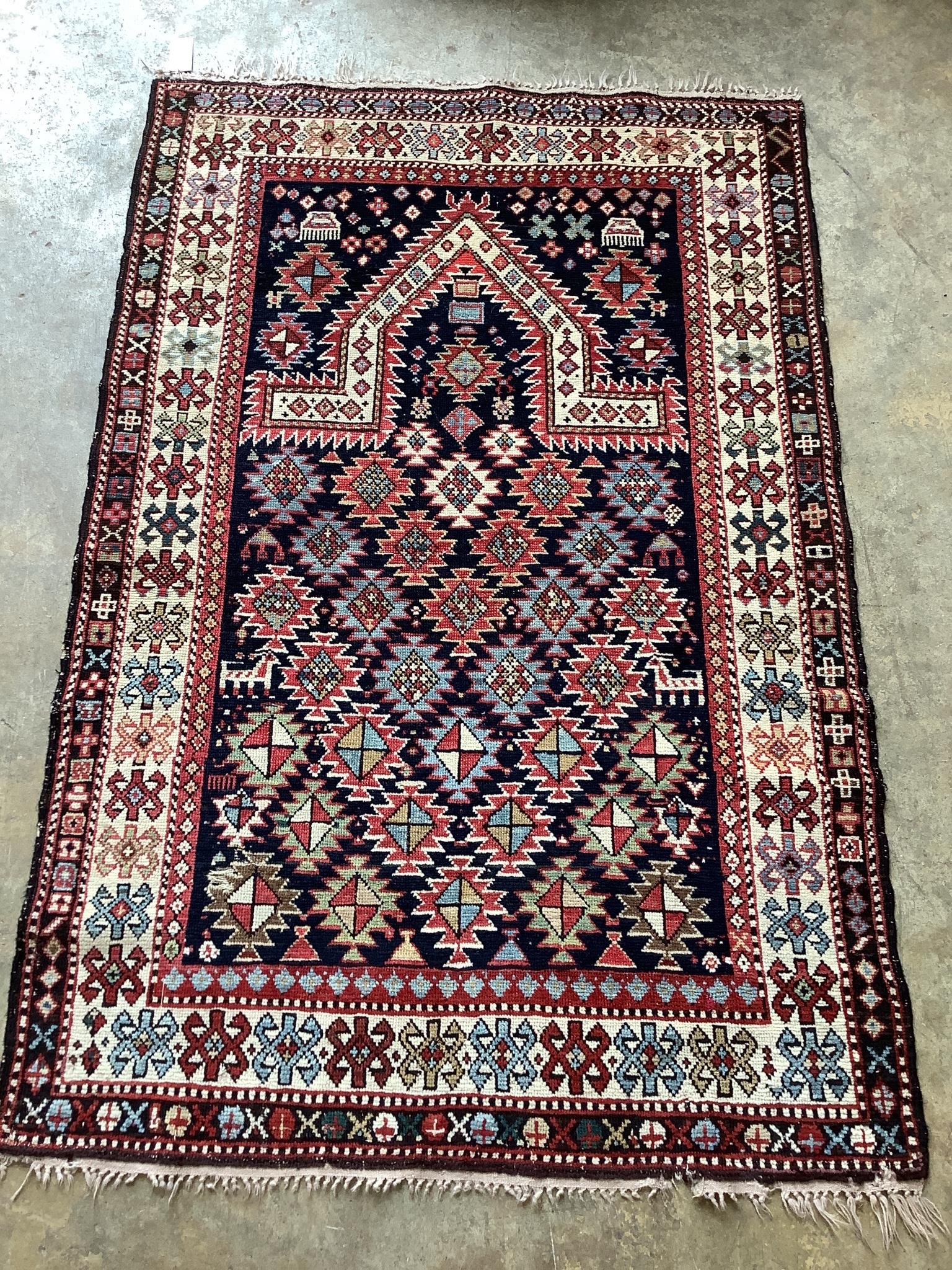 A Caucasian blue ground prayer rug, 153 x 102cm